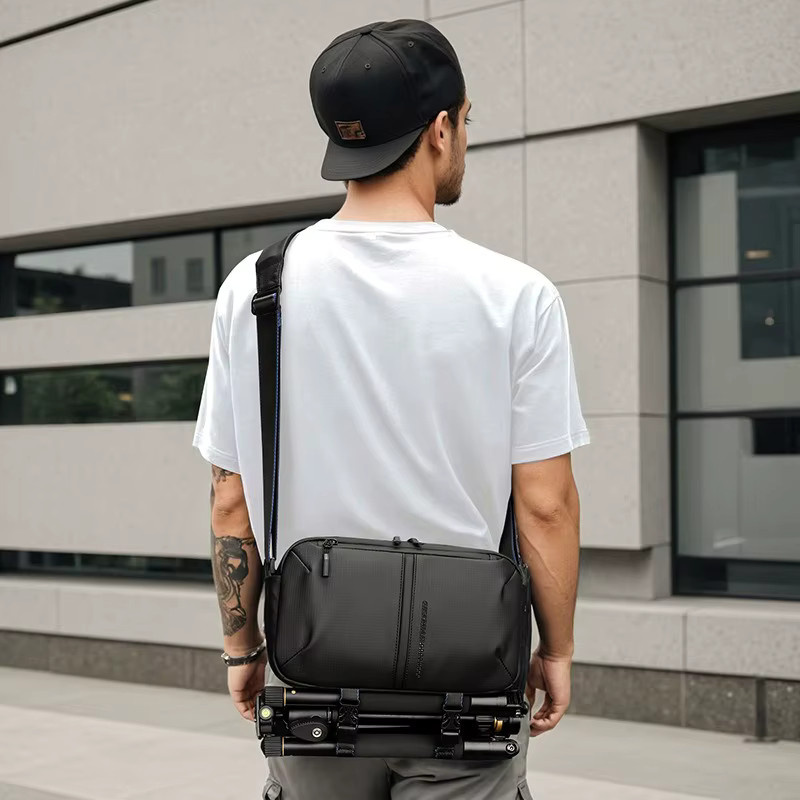 Multifunktionale DSLR-Kameratasche von JINNUOLANG als tragbare Einschulter-Umhängetasche und geräumige Casual-Reisetasche in Schwarz oder Grau - Bild 3