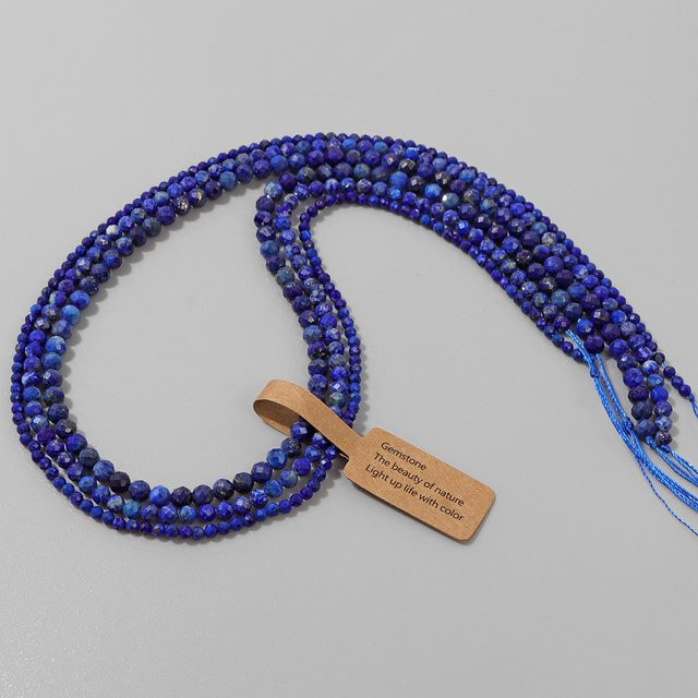 Rainagem Distanzperlen Lapislazuli, facettiert, rund, 2-4 mm, Unisex - Bild 1