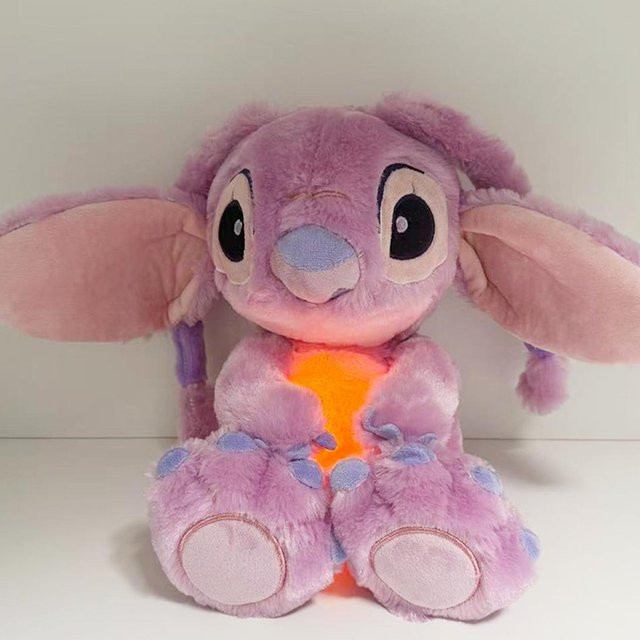 Discover Intime Snoopy und Lilo & Stitch Plüschtier, mit Musik und Licht, ab 14 Jahren - Bild 1