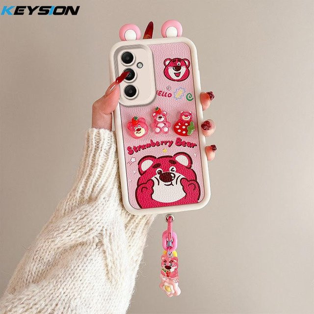 KEYSION 3D Cartoon Handyhülle mit Armband für Samsung Galaxy A55 5G, A35, A25 und A15 5G aus weichem Silikon in Pink - Bild 1
