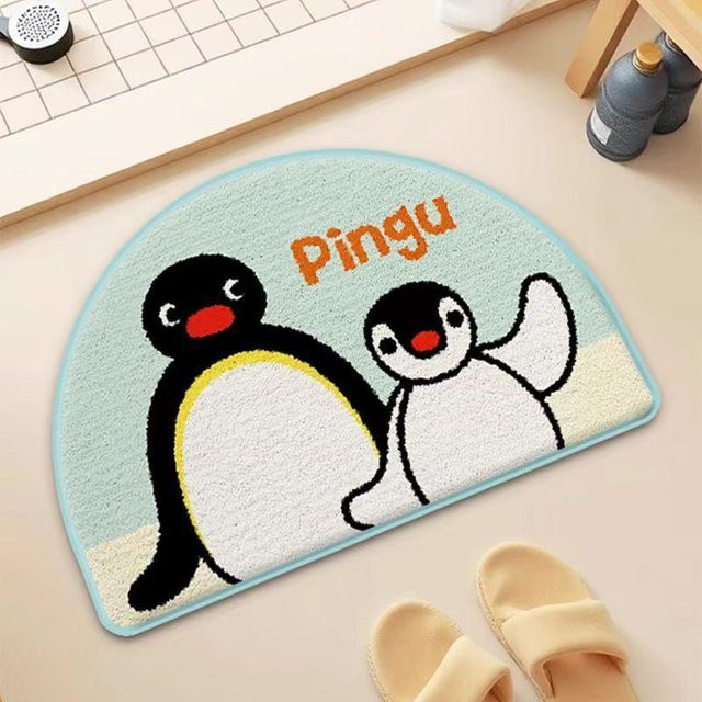 Saugfähige Fußmatte mit Cartoon Pinguin Familie aus Imitationskaschmir, rutschfest und antibakteriell, B/B: 40 x 60 cm, Multicolor - Bild 1