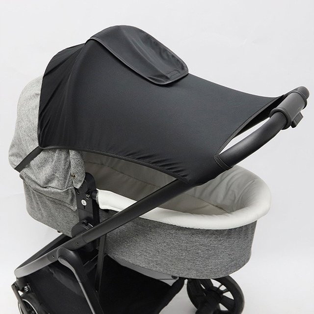 Universeller Sonnenschutz für Kinderwagen und Autositze mit UV-Schutz in Schwarz - Bild 1