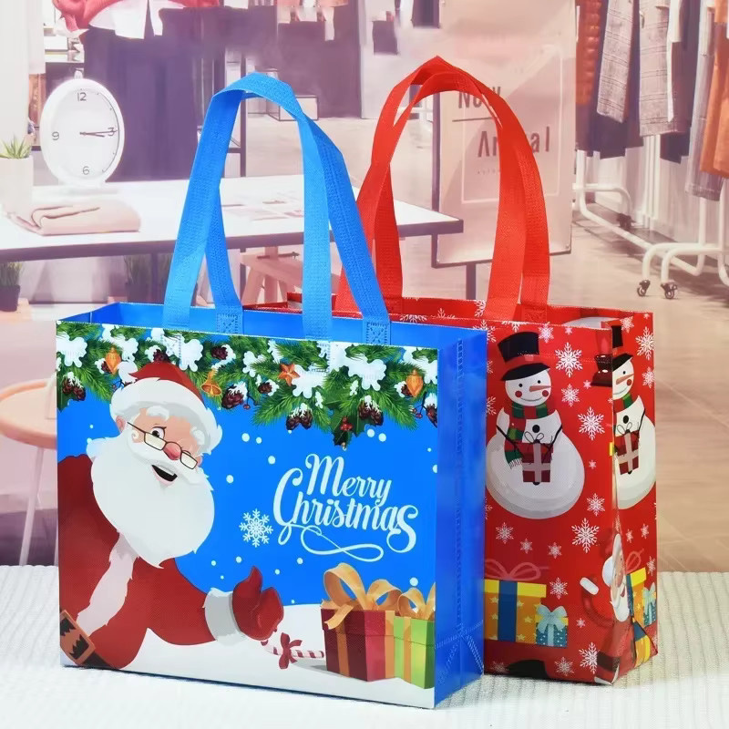 Weihnachtsgeschenktüten mit Santa, Elch und Schneeflocken Motiv, rote wasserdichte Vliesbeutel für Kinder, B: 32 cm, H: 32 cm, T: 10 cm - Bild 3