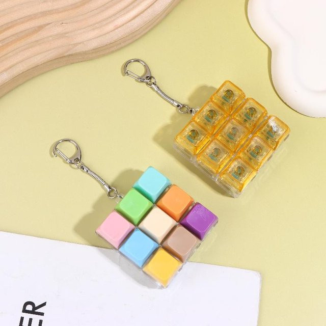 Velishy Schlüsselanhänger, 9-Tasten Finger-Tastaturkappen, Unisex - Bild 1
