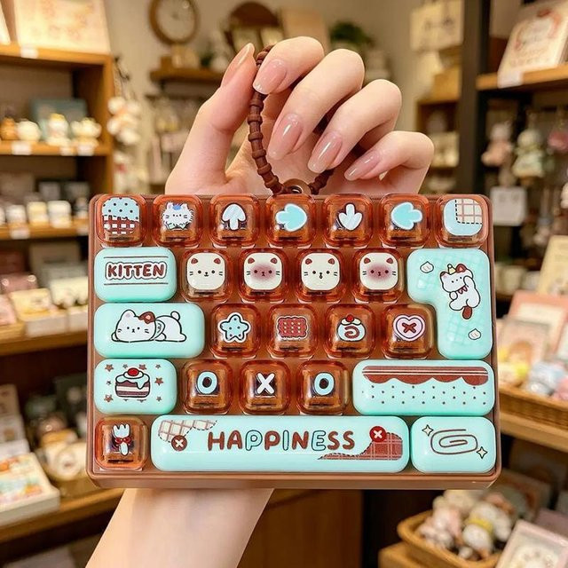 A Family Of Home Textiles Gitter Tastenkappe Clicker, Anti-Stress Fidget Tastatur Schlüsselanhänger, Dekompressionsknopf - Bild 1