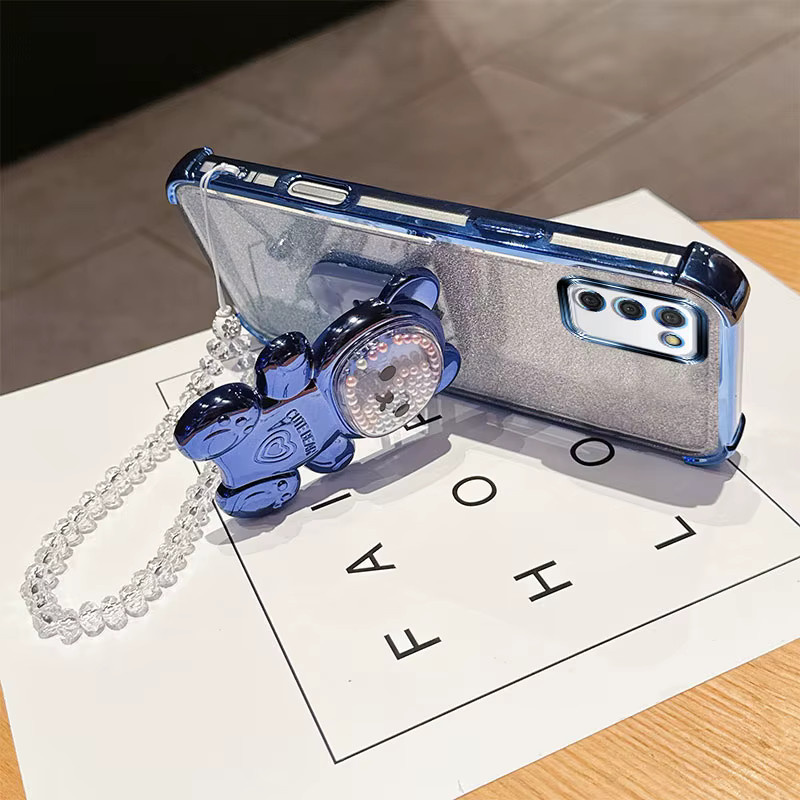 Stoßfeste Samsung Handyhülle in Pink mit niedlichem 3D-Bär-Ständer und Kristallketten-Lanyard für Android Modelle A02s, A03s, M02s und F02s - Bild 1