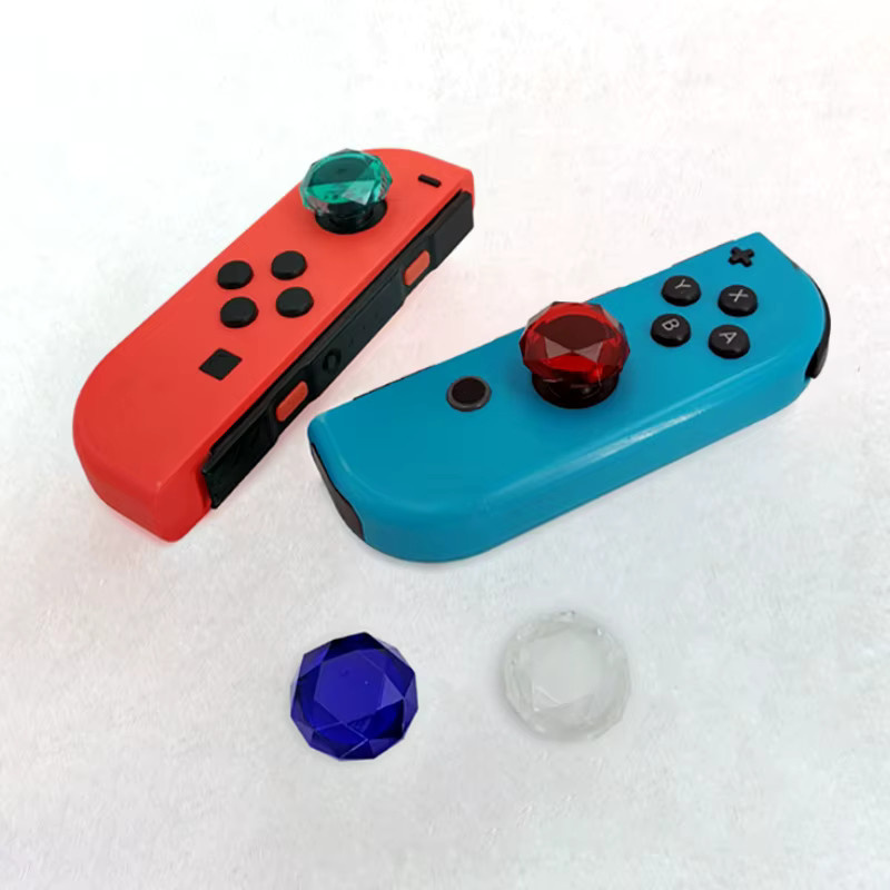 Yu Xi Kristall Joystick Daumen Grip Abdeckung für Nintendo Switch Lite, 2 Stück, Transparent und Multicolour - Bild 2