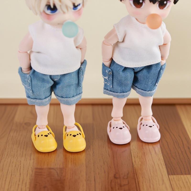 Yiran toy 1 Puppenzubehör Welpen Bär Schwein Schuhe 2-teiliges Set - Bild 1