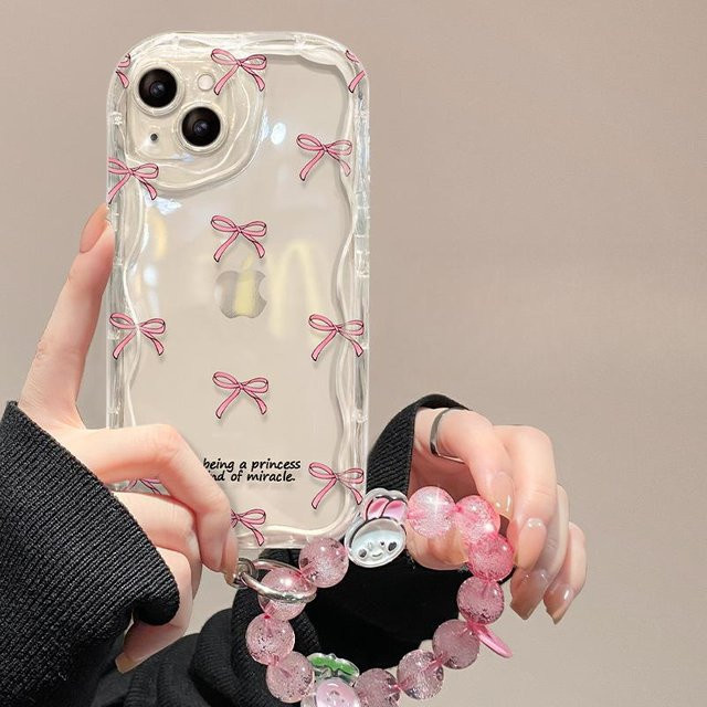 Transparente Silikon Handyhülle mit rosa Schleifenarmband für Apple iPhone 15, 14, 13 Pro Max, 12, 11, Xs und X - Bild 1