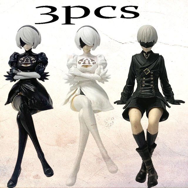 Sammlerfigur ZXZ in Sitzposition, schwarz-weiß, aus PVC, Höhe: 13 cm - Bild 1