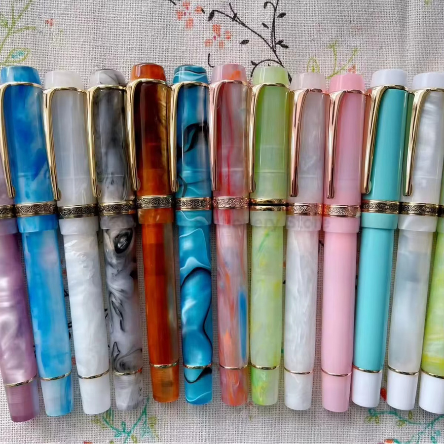 Kaigelu Füllfederhalter aus Acryl mit Goldfeder und Bernstein-Marmor-Muster in Weiß und Multicolour - Bild 1