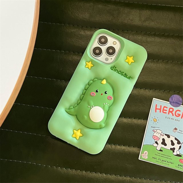 MUQGEW Silikon Handyhülle mit Kawaii Cartoon Dinosaurier für iPhone 12 bis 17 Pro Max, stoßfest und zur Stressbewältigung, Farbe: Grün - Bild 1