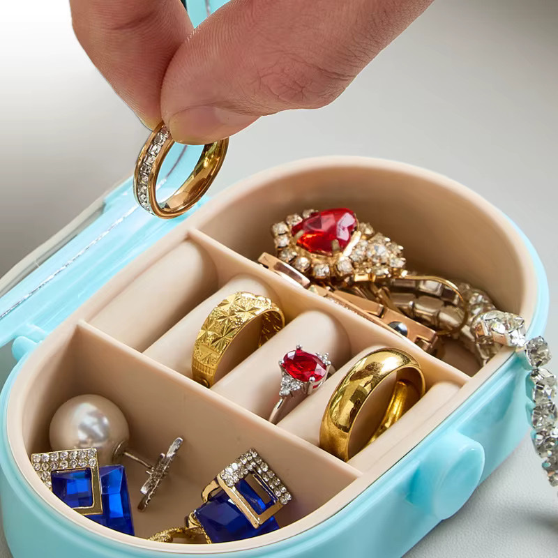 Luckyiasv Schmuckschatulle für Schmuck und Make-up mit Spiegel in Gold und Weiß, tragbare Aufbewahrungsbox für Ringe, Halsketten und Ohrringe - Bild 2