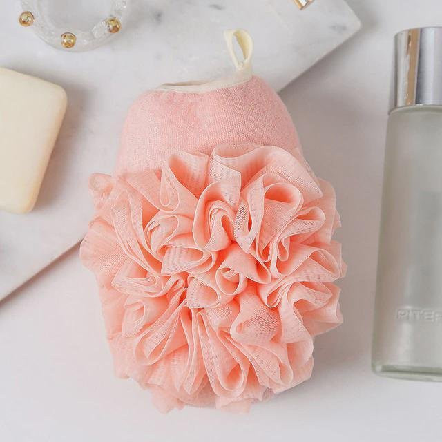 Rosa Peeling-Handschuhe und Duschblumen zur Körperreinigung für dein Badezimmer - Bild 1