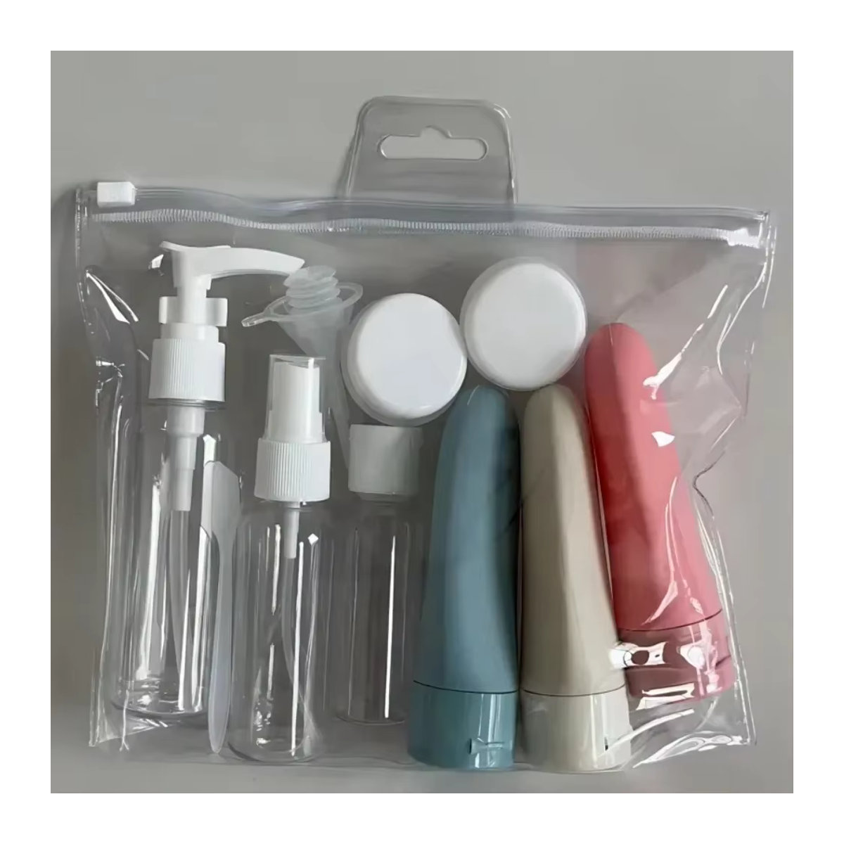11-teiliges Reiseflaschen-Set in Bunt mit Aufbewahrungstasche, leere Behälter für Lotionen und Cremes inklusive Sprühflasche und Quetschröhrchen - Bild 3