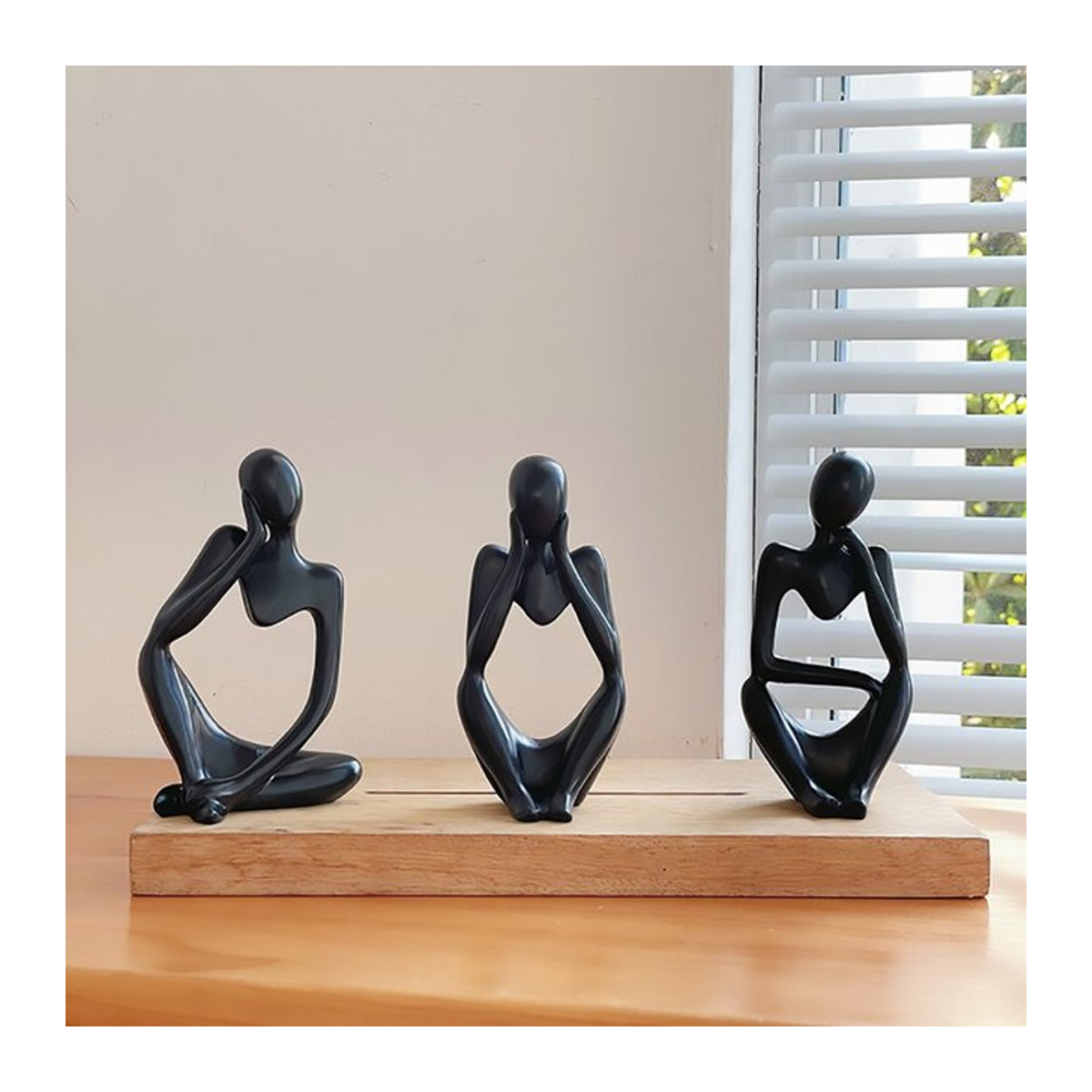 3er-Set TWISTER.CK Mini-Denker-Skulpturen aus Kunstharz in Gold und Schwarz als abstrakte Desktop-Ornamentik für dein Heimbüro - Bild 1