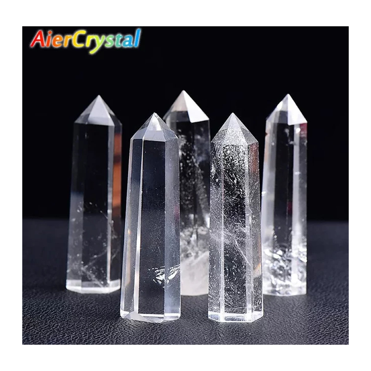 AierCrystal Natürlicher klarer Quarz Kristall Obelisk in Weiß und Transparent als dekorativer Heilstein in sechseckiger Form - Bild 1