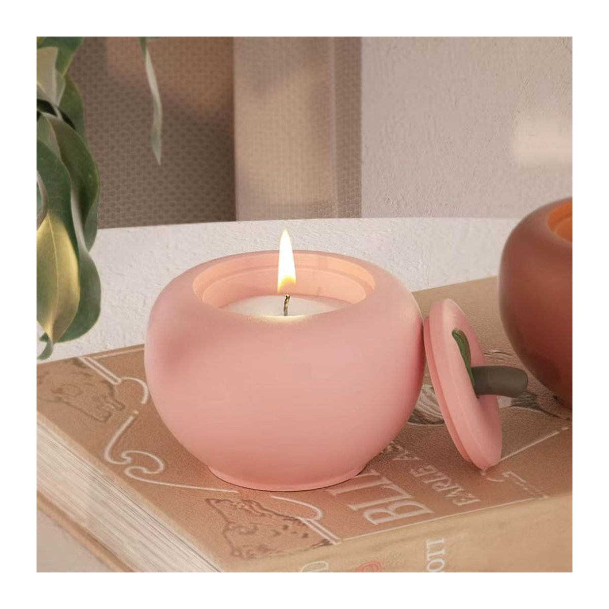Apfelförmige Aufbewahrungsbox mit Deckel aus Silikon in Rosa für DIY-Handwerk und Schmuckaufbewahrung - Bild 1
