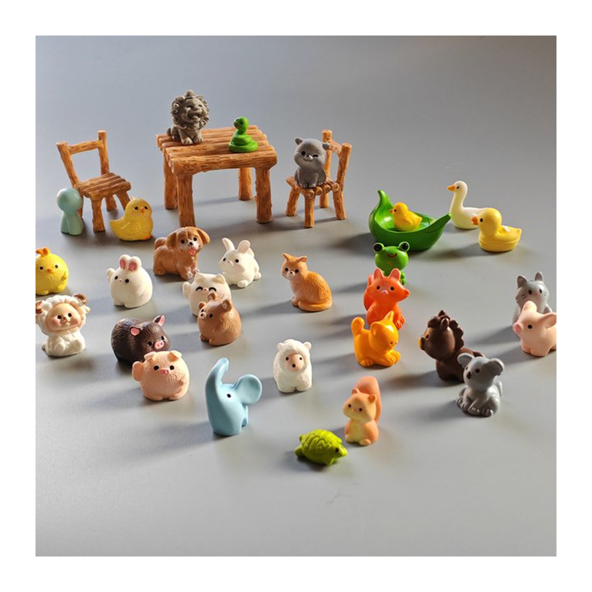 BAIUFOR 10er Set Miniatur Tierfiguren aus Kunstharz in Bunt für Garten Deko und Fee Garden Zubehör - Bild 1