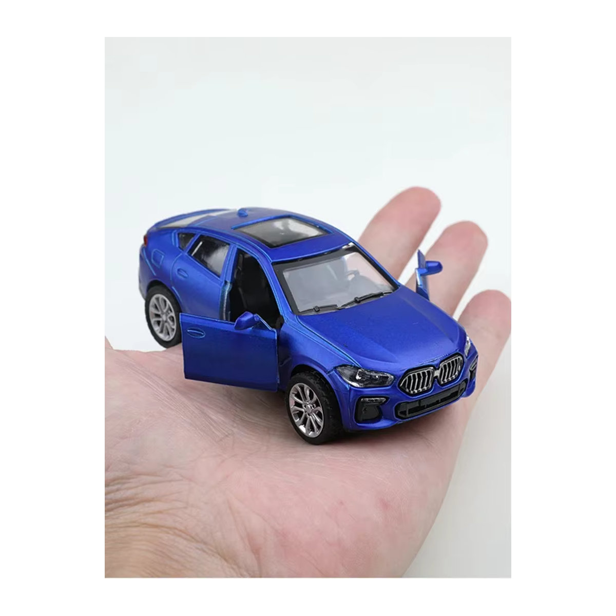 Blaues Modellauto Geländewagen aus Metall mit öffnbarer Tür als Dekorationsmodell - Bild 6
