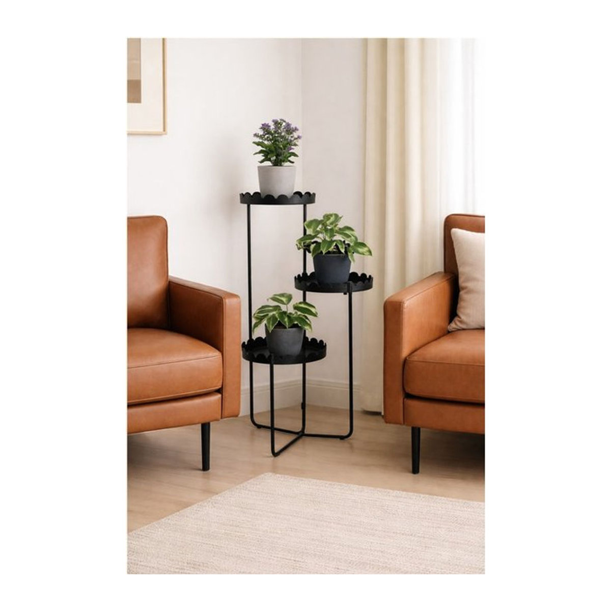 Blumenständer aus Metall von Möbel direkt in Schwarz, rund und minimalistisch, freistehend - Bild 1