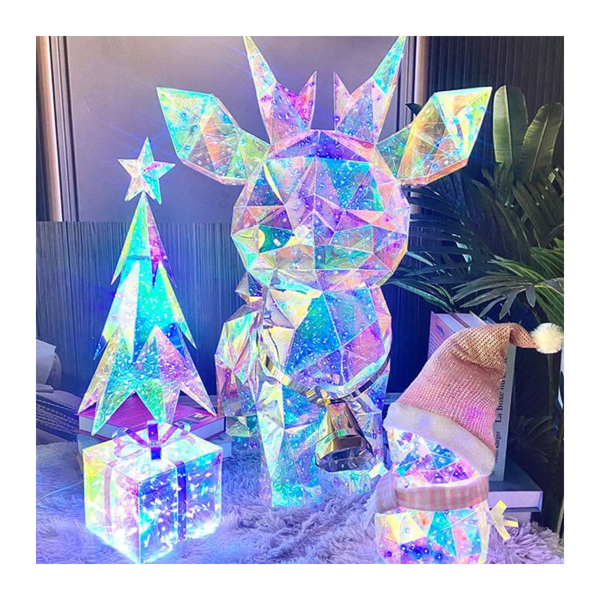 Buntes Weihnachts-Nachtlicht aus Kunststoff mit Elch, Weihnachtsmann, Schneemann und Weihnachtsbaum als Geschenk für Kinder - Bild 1