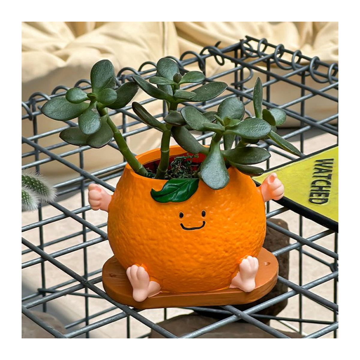 Dekorativer Blumentopf in Form eines lächelnden Gesichts aus Kunstharz, Orange, ideal für Garten und Außenbereich - Bild 1