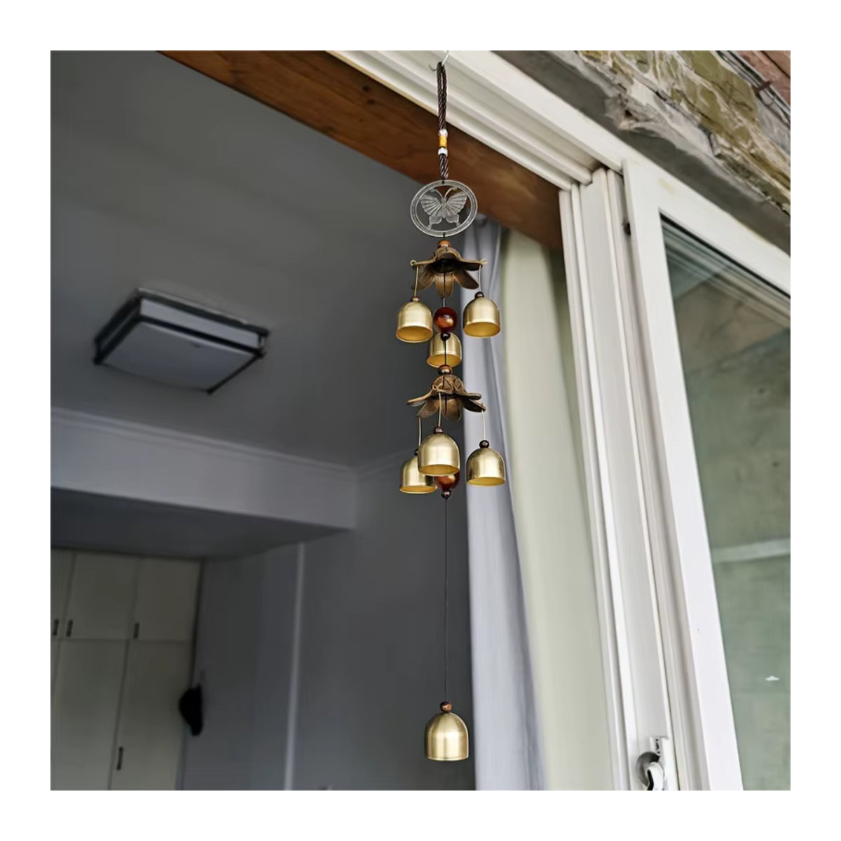 Doppelter Metallglocken-Anhänger im Bohemian-Stil mit Schmetterlingen in Messingfarbe als Windspiel zur Dekoration für dein Zuhause oder deine Terrasse - Bild 5