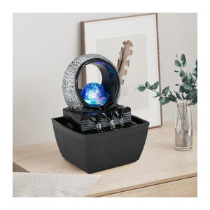 Dreamburgh Tischwasserbrunnen mit LED-Beleuchtung und Rolling Ball als Feng Shui Dekoration aus Kunstharz in Grau und Schwarz