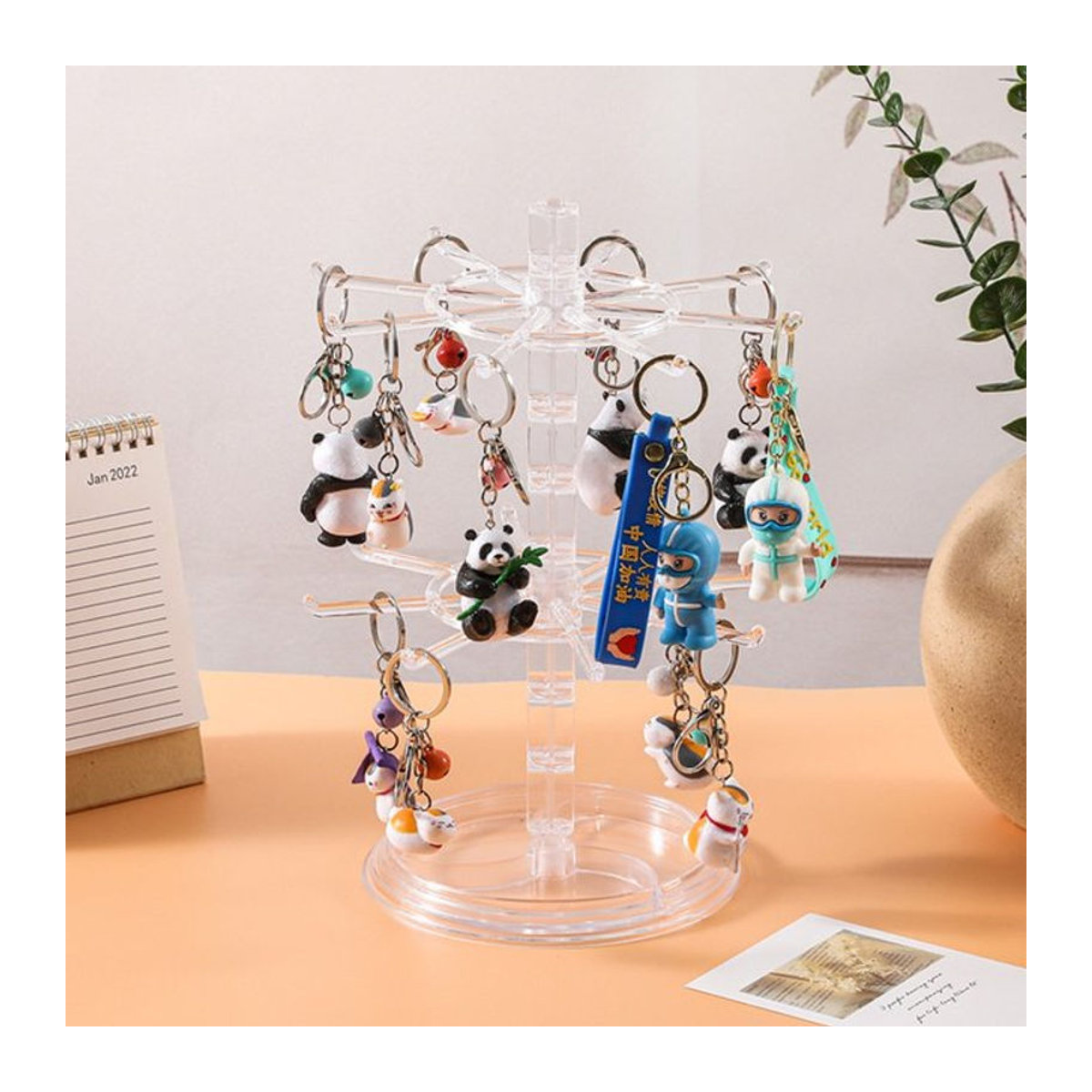 Drehbarer Schmuckständer aus transparentem Kunststoff für Ohrringe, Armbänder und Halsketten - Bild 1
