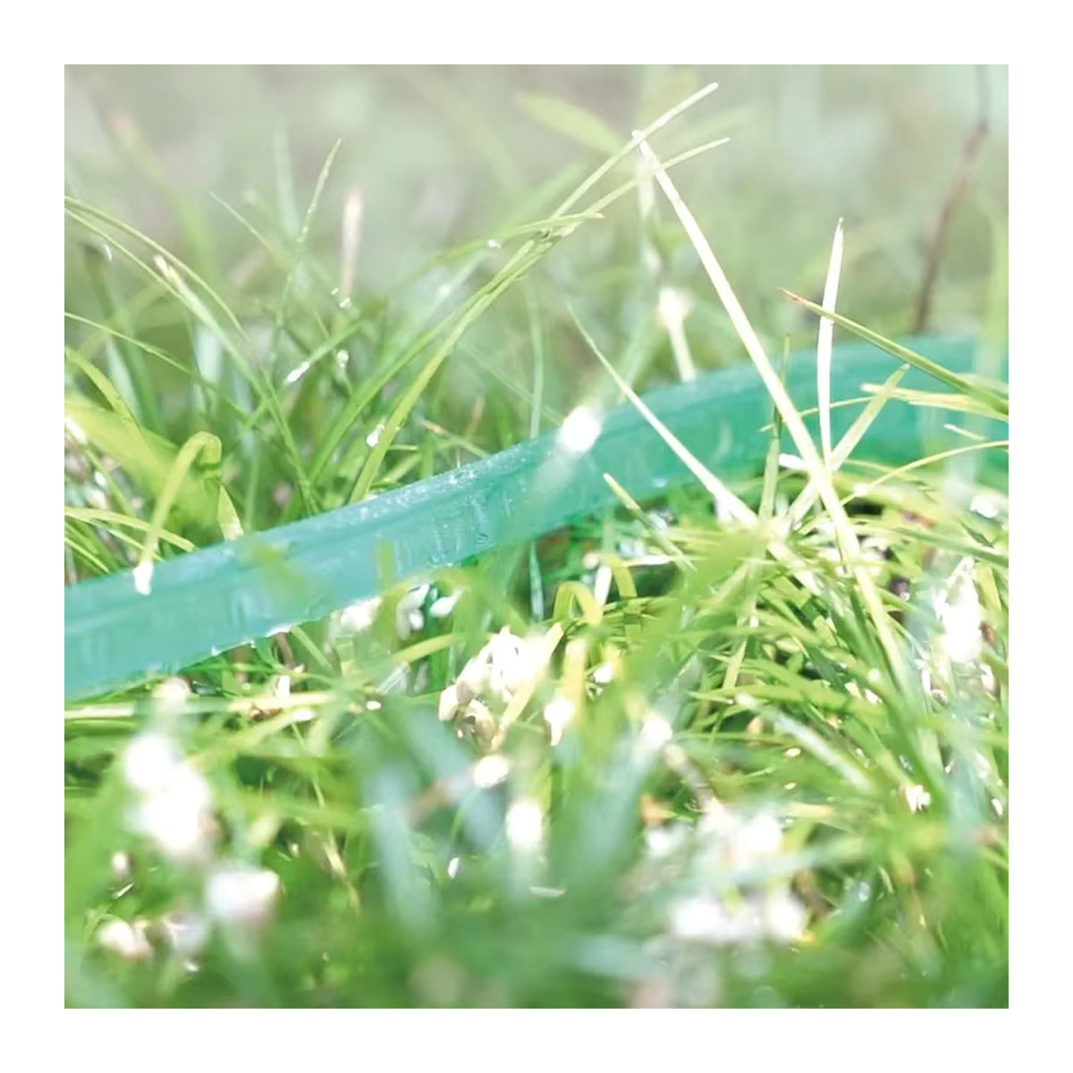 Grüner Sprühschlauch als Soaker Schlauch und Sprinkler Set zur Bewässerung von Garten und Rasen - Bild 4