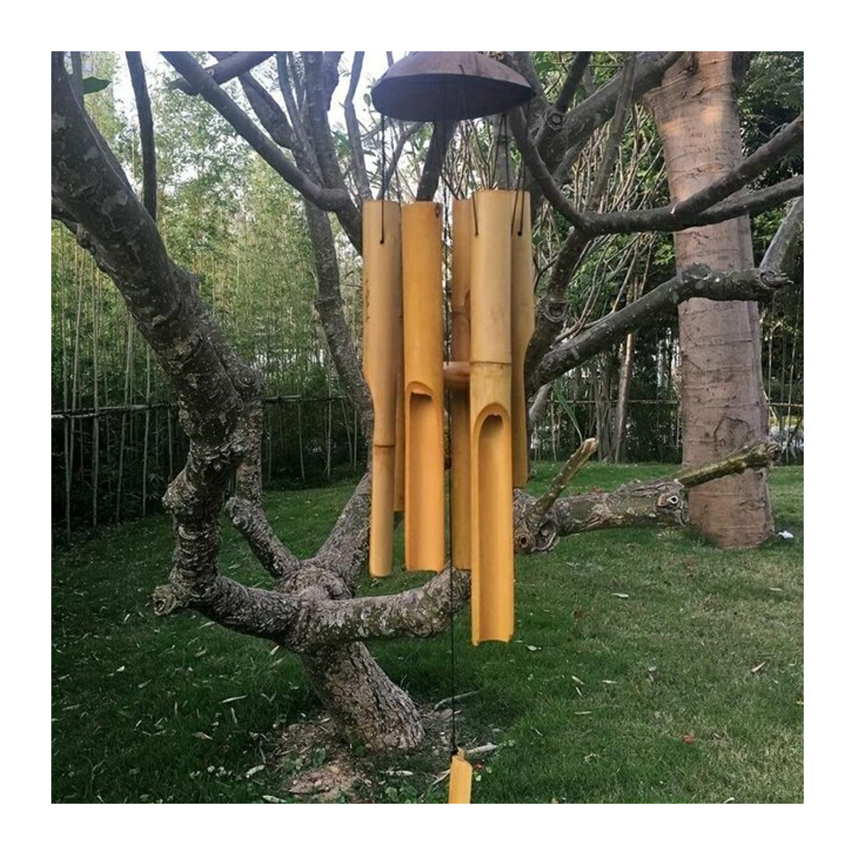 Handgefertigtes Bambus-Windspiel in Gelb mit Kokosnuss-Akzenten für Garten und Terrasse - Bild 1