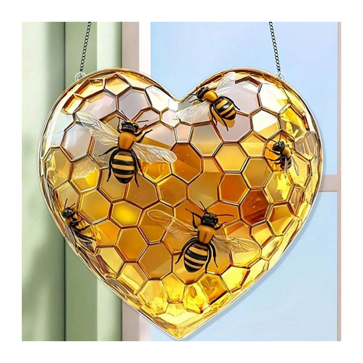 Herzförmiger Waben-Sonnenscheinfänger aus Glas in Gelb als hängende Wanddekoration im Landhausstil - Bild 1