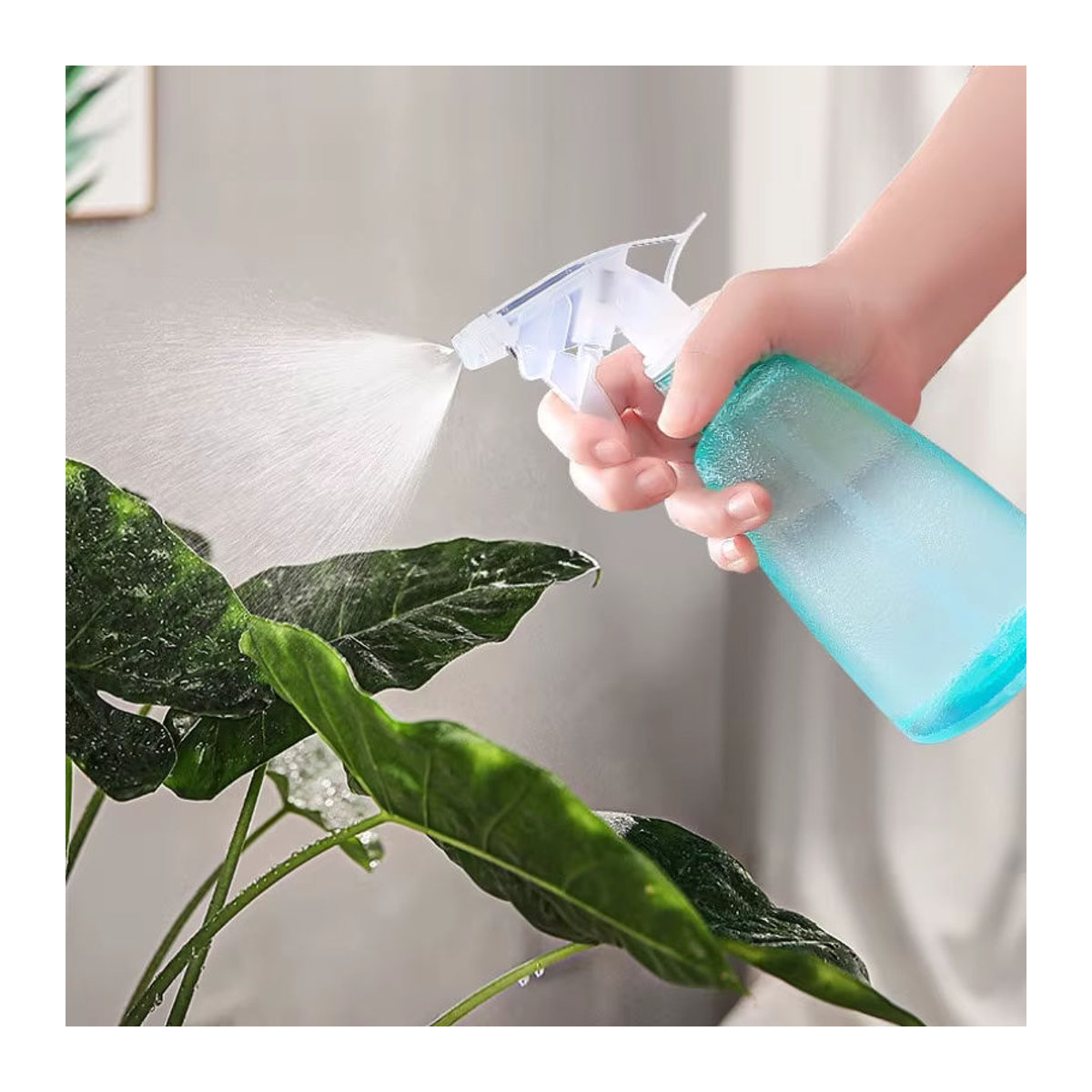 Kleine Gießkanne aus Kunststoff in Blau mit 500 ml Fassungsvermögen - Bild 2