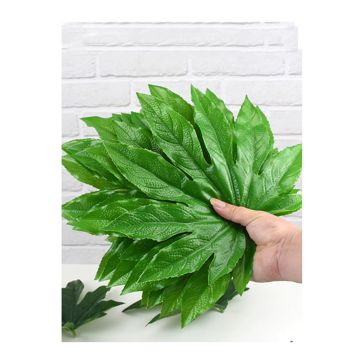 Kmitang Künstliche Fatsia-Blätter in Grün, Tropische Kunststoff-Monstera-Blätter für Dekoration - Bild 3
