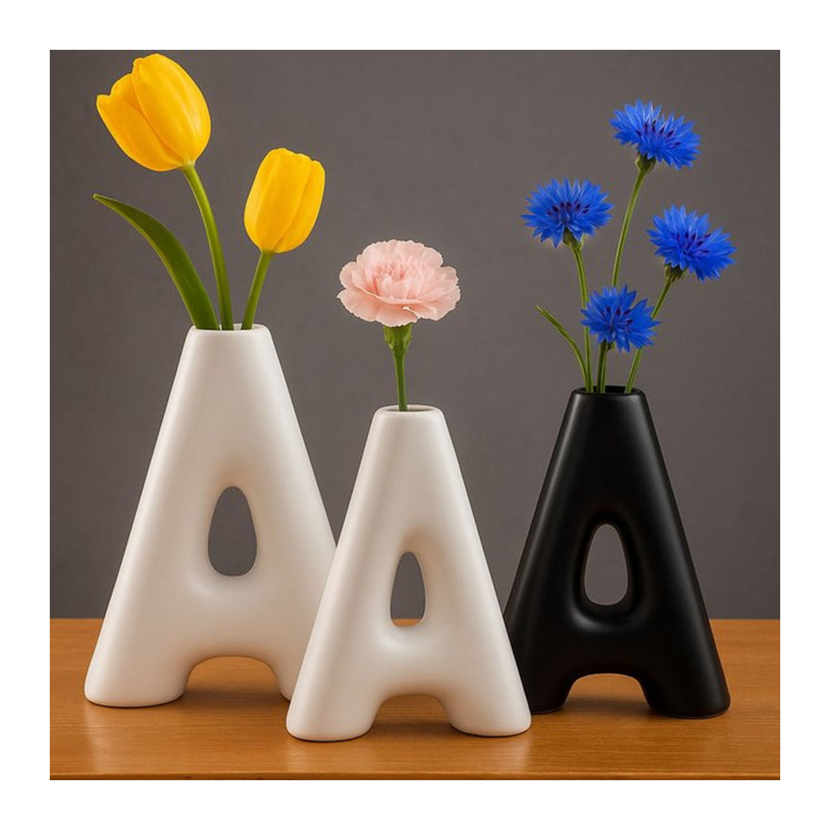 Kreative A-förmige Keramikvase in Schwarz und Weiß für Schnittblumen als minimalistische geometrische Desktop-Dekoration - Bild 1