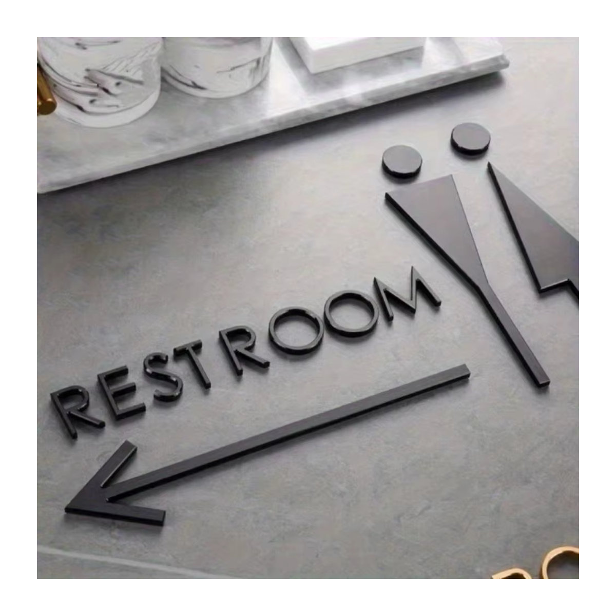 LUXSIGNCRAFT Luxus-Waschraumschild aus Acrylglas in Schwarz und Gold mit modernem Typografie-Design zur Wandmontage - Bild 3