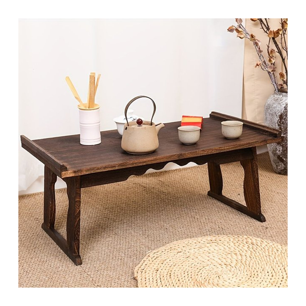 Minimalistischer Couchtisch aus Holz in Nussbaum Braun, rechteckiger japanischer Beistelltisch mit faltbaren Beinen - Bild 1
