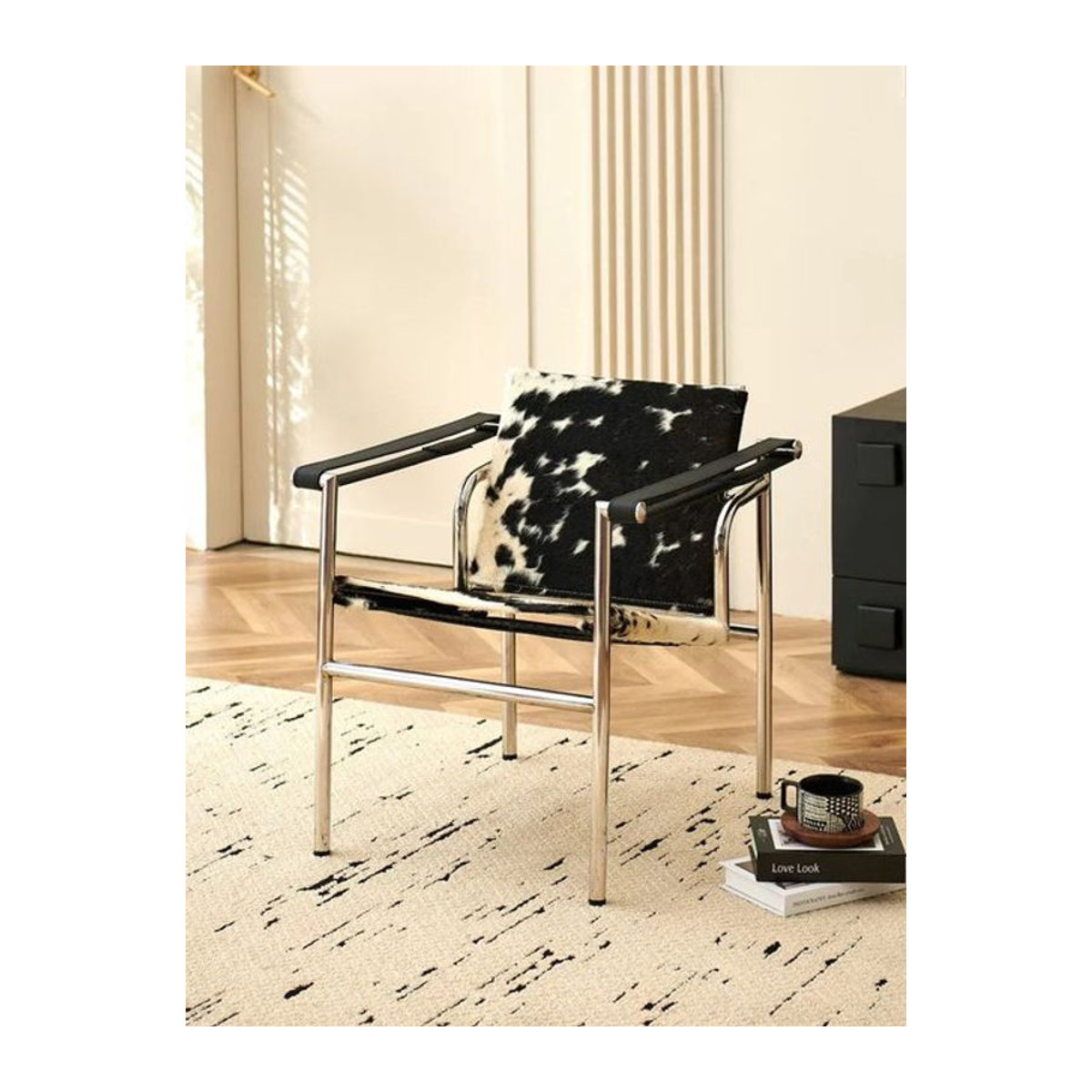 Moderner Loungesessel aus Kunstleder in Schwarz/Weiß mit Edelstahlgestell für dein Wohnzimmer - Bild 1