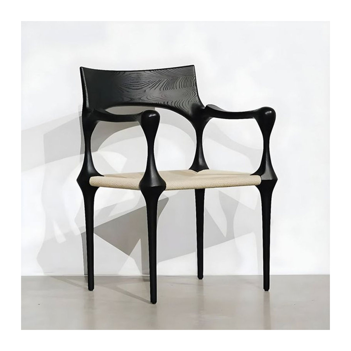 Oein Holzstuhl im modernen skandinavischen Retro-Design mit Stoffbezug in Schwarz/Weiß - Bild 1