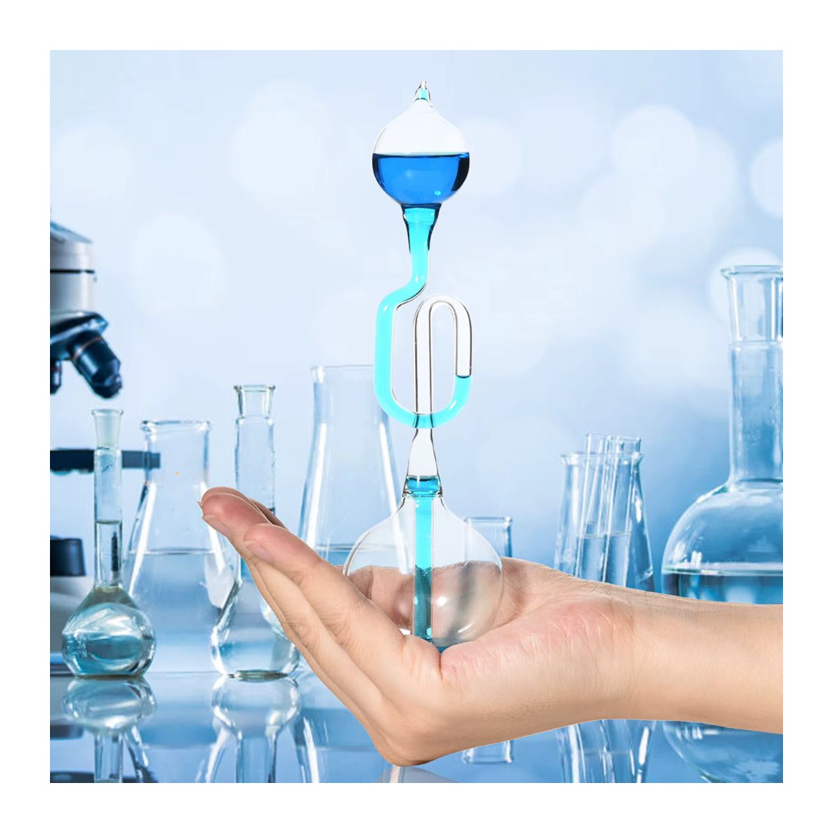 Qiilu Thermometer Spielzeug in Blau als modernes Home Ornament und Stressabbau Gadget aus Glas - Bild 3