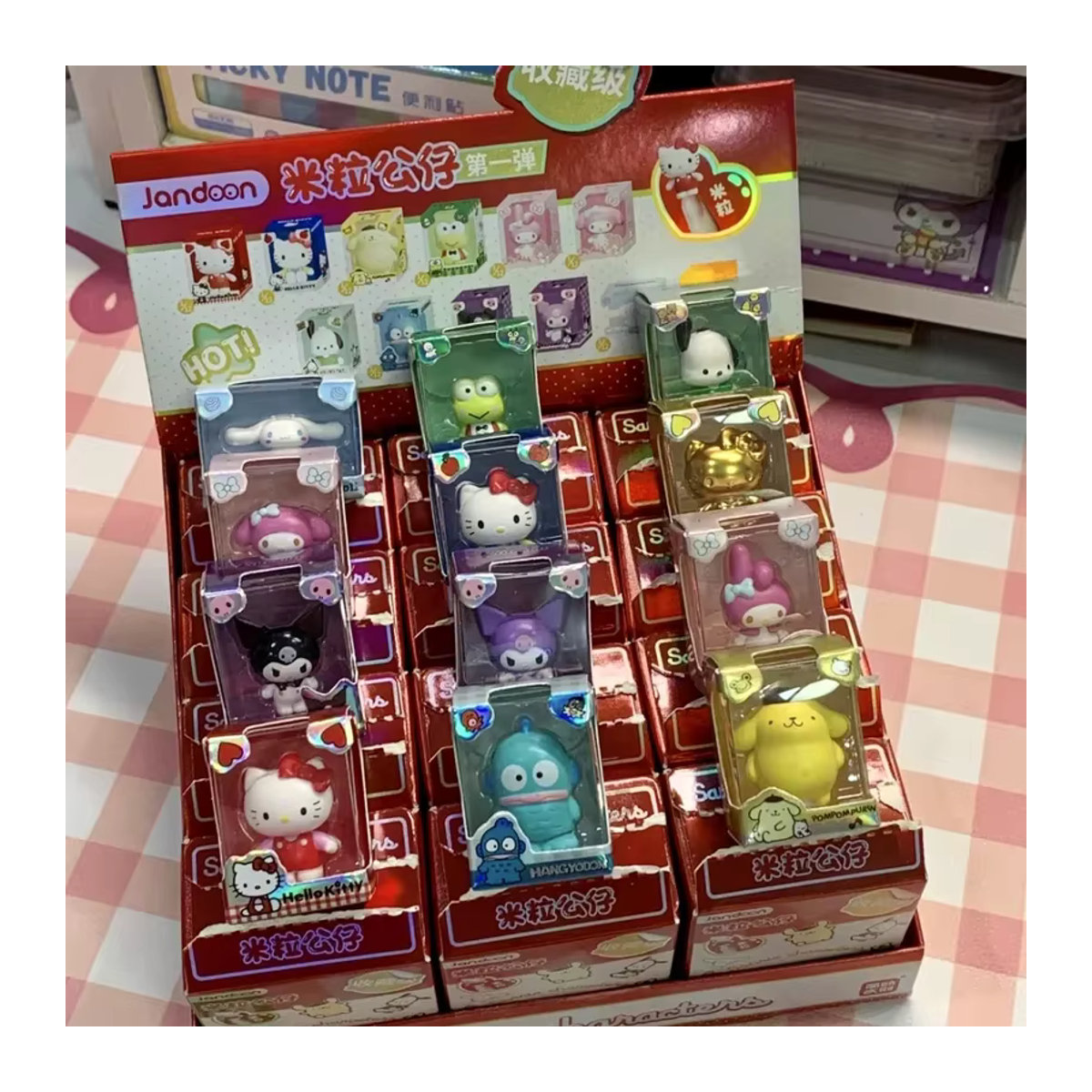 Sanrio Family Reiskorn-Puppe Blindbox mit Hello Kitty und Kuromi Mini Sammelfiguren aus Kunststoff, mehrfarbig - Bild 2