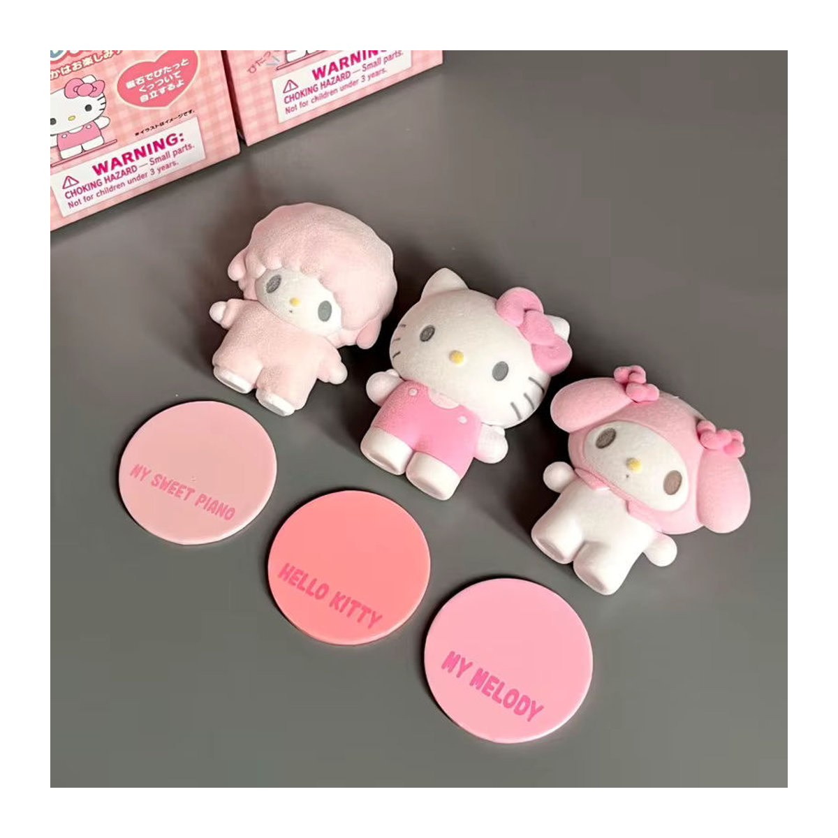Sanrio Magnetische Saugbox Blind Box mit Hello Kitty, Kuromi und Cinnamoroll als hochwertige Kunststoff-Puppen in Rosa für deine Desktop-Dekoration - Bild 2