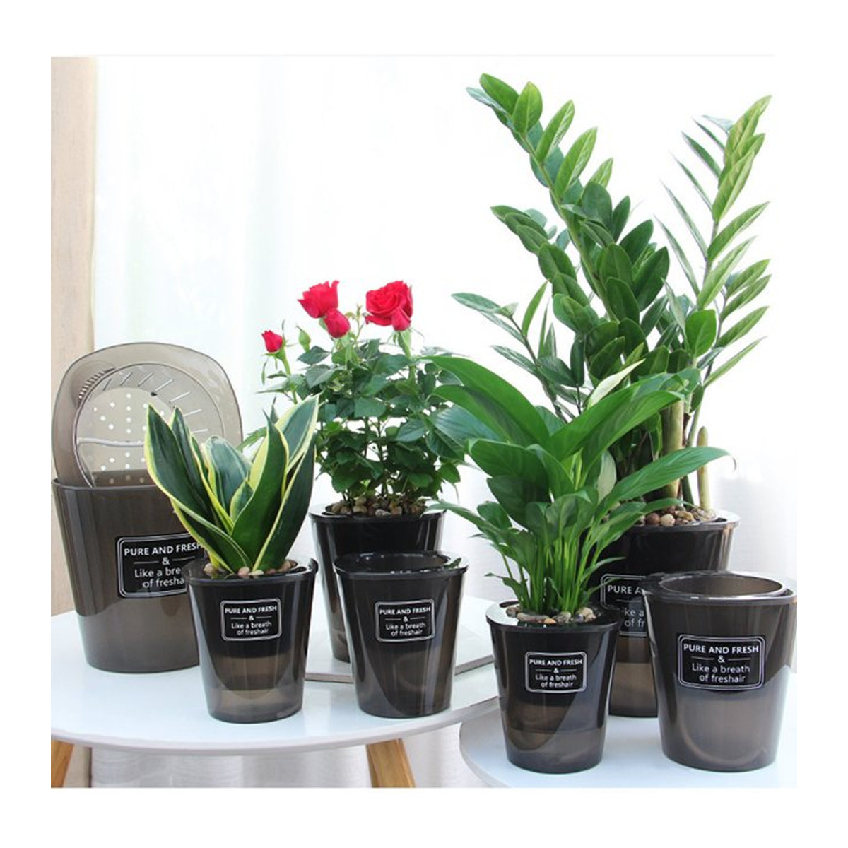 Selbstansaugender Blumentopf im skandinavischen Design aus Kunststoff, schwarz, rund und stehend - Bild 1