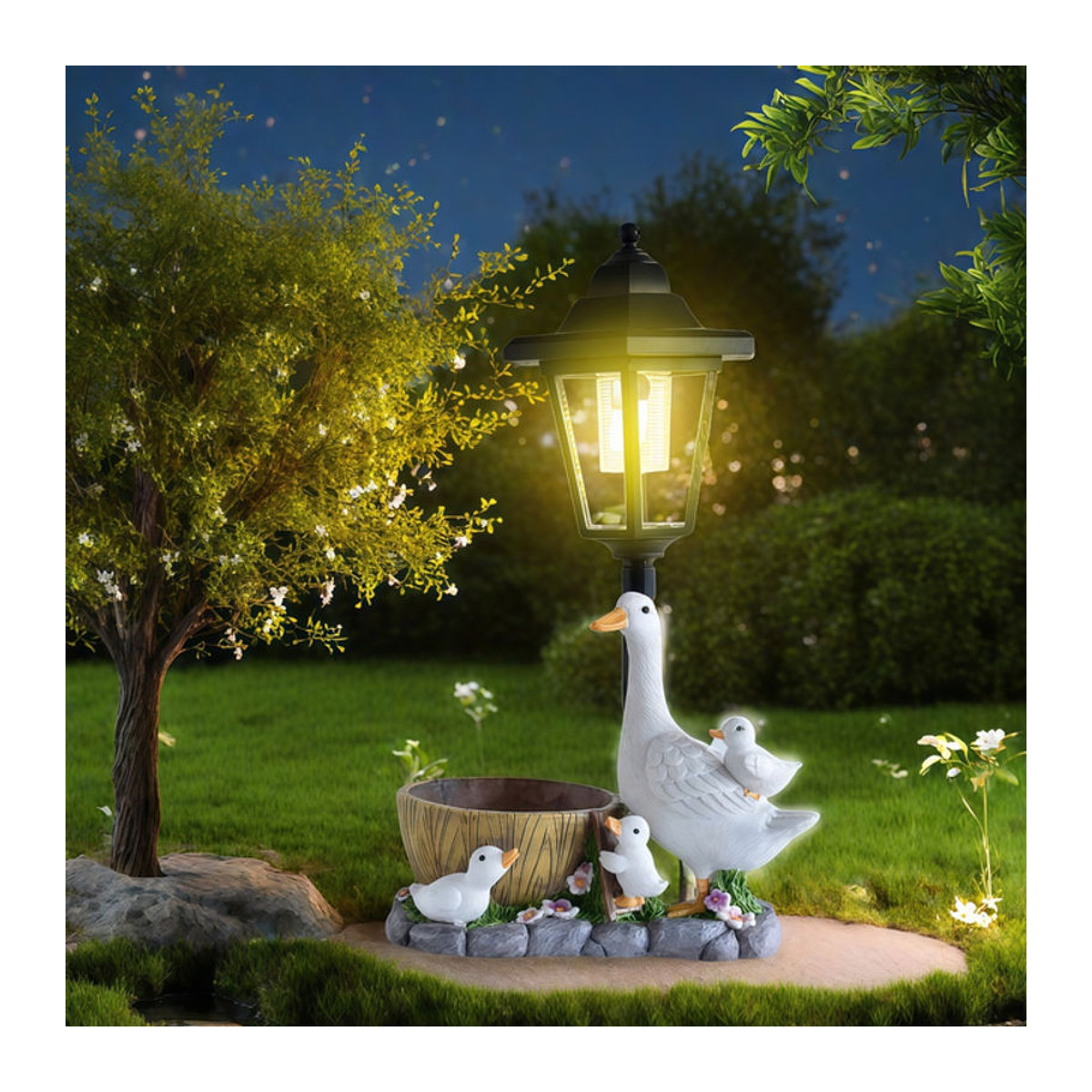 Solar Ente LED Nachtlicht aus Kunstharz in Weiß als dekorative Garten Skulptur und Außenbeleuchtung - Bild 1