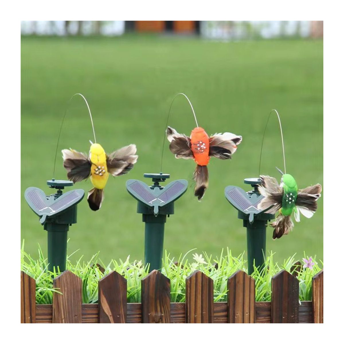 Solar Kolibri Deko-Figur mit künstlichen Federn in bunten Farben für Garten und Auto - Bild 2