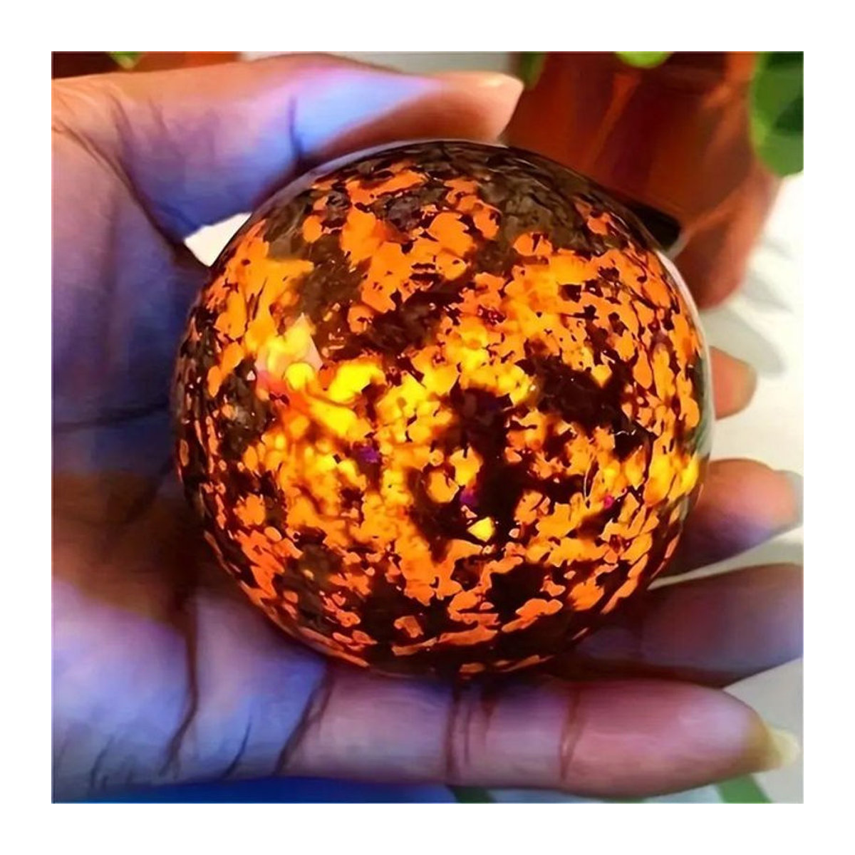 TAIHESJ Yooperlite Fluoreszierende Kugel aus natürlichem Kristall in Orange mit Kugelsitz - Bild 1