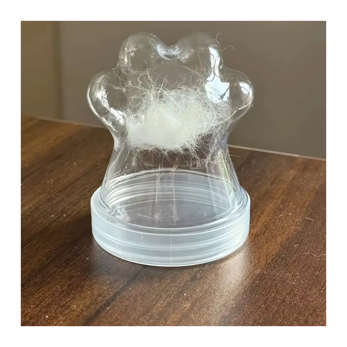 Transparente Glasflasche in Katzenpfotenform als Erinnerungsglas für Haustierfell und Andenken - Bild 1