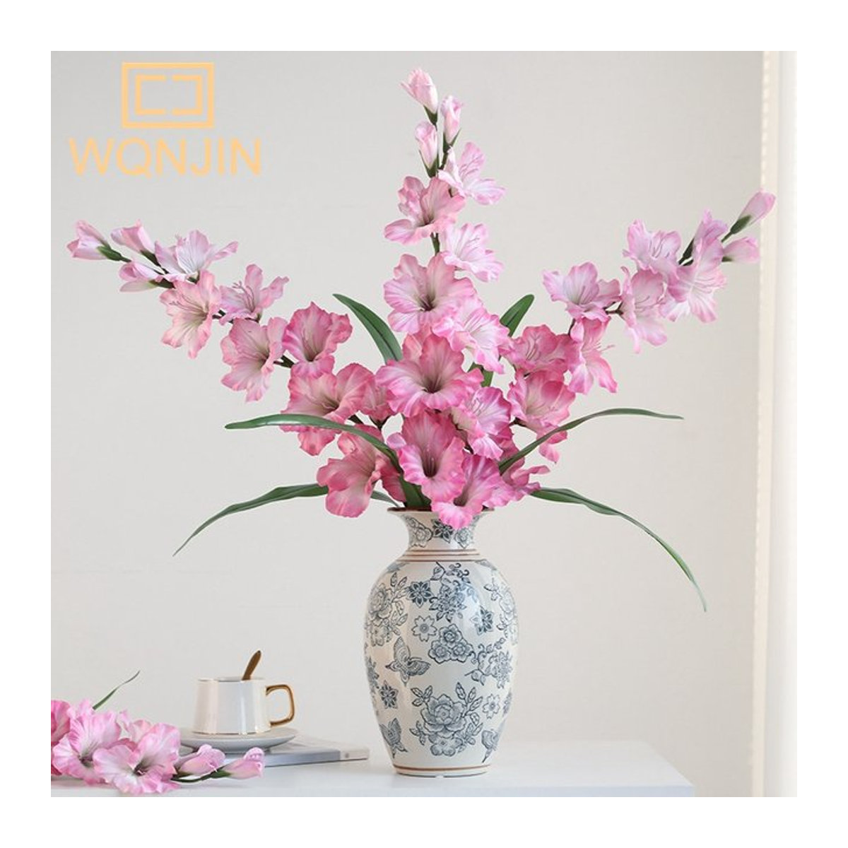 WQNJIN Künstliche Orchidee mit Schmetterling in Rosa als Dekoration für Wohnzimmer und Hochzeit - Bild 1