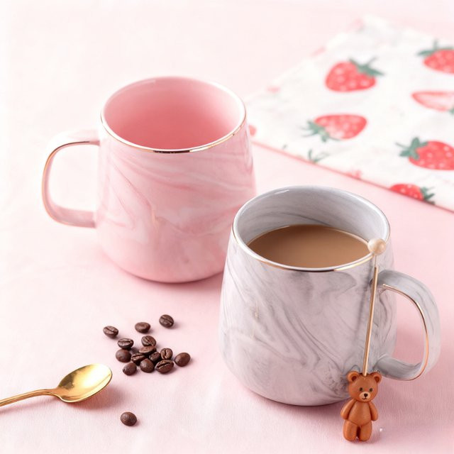JUSTINLAU Keramiktasse in Rosa und Grau mit Marmoroptik und Goldrand - Bild 1